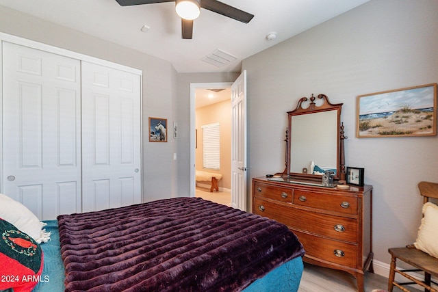 bedroom with a closet and ceiling fan