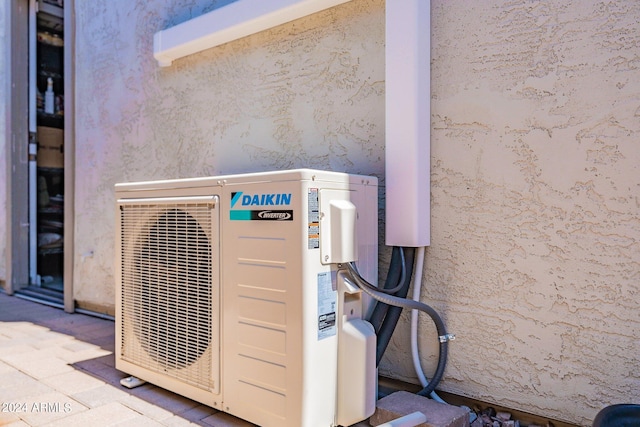 details with ac unit and stucco siding