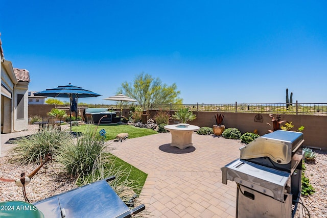 view of patio featuring grilling area and a fenced backyard