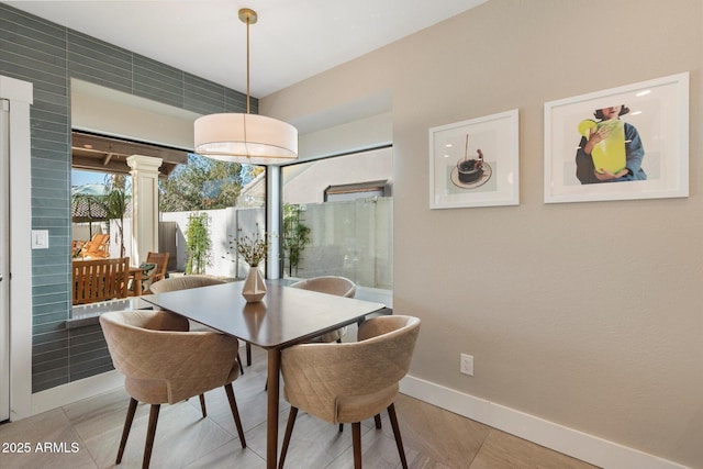 9915 E Cinnabar Ave, Scottsdale, AZ 85258 - dining area with baseboards
