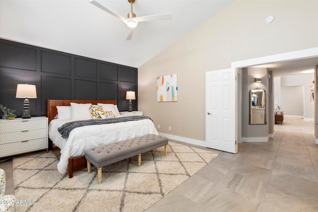 9915 E Cinnabar Ave, Scottsdale, AZ 85258 - bedroom with baseboards, a decorative wall, high vaulted ceiling, and ceiling fan
