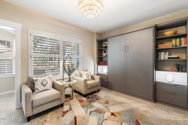 9915 E Cinnabar Ave, Scottsdale, AZ 85258 - living area featuring a wealth of natural light and baseboards