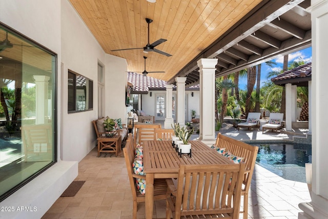 9915 E Cinnabar Ave, Scottsdale, AZ 85258 - view of patio / terrace featuring a ceiling fan, outdoor dining area, and an outdoor pool