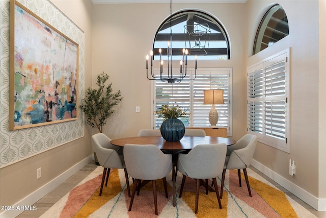 9915 E Cinnabar Ave, Scottsdale, AZ 85258 - dining room with baseboards and a notable chandelier