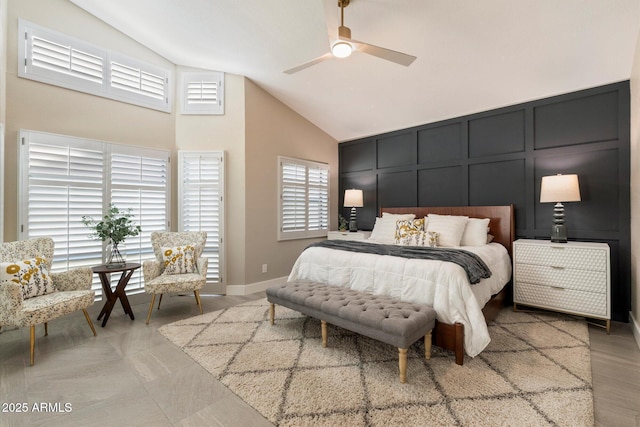 9915 E Cinnabar Ave, Scottsdale, AZ 85258 - bedroom featuring high vaulted ceiling, baseboards, a ceiling fan, and a decorative wall