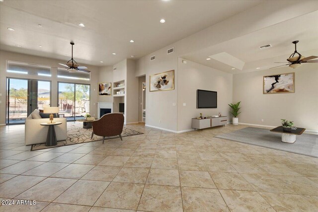 36908 N 19th St, Phoenix, AZ 85086 - living room featuring a ceiling fan, recessed lighting, light tile patterned floors, and baseboards