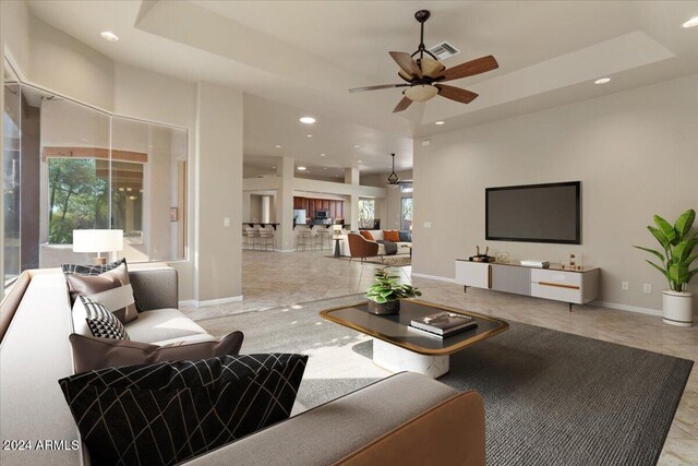 36908 N 19th St, Phoenix, AZ 85086 - living room featuring ceiling fan, recessed lighting, baseboards, and a tray ceiling
