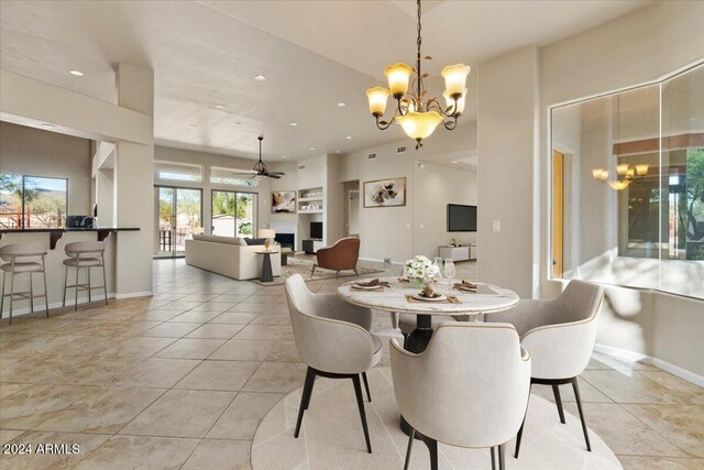 36908 N 19th St, Phoenix, AZ 85086 - dining room featuring a chandelier, light tile patterned floors, recessed lighting, baseboards, and a ceiling fan