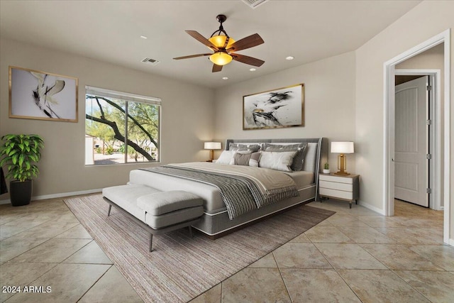 bedroom featuring ceiling fan and light tile patterned floors