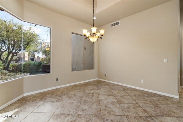 36908 N 19th St, Phoenix, AZ 85086 - spare room featuring a chandelier and baseboards