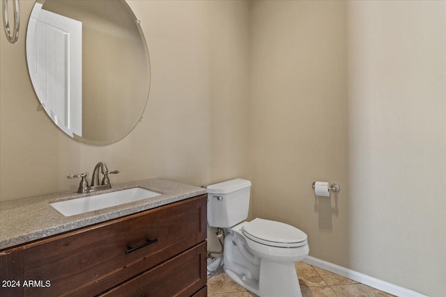 36908 N 19th St, Phoenix, AZ 85086 - bathroom with toilet, vanity, baseboards, and tile patterned flooring