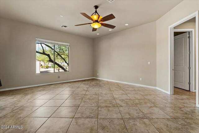 36908 N 19th St, Phoenix, AZ 85086 - empty room featuring ceiling fan, recessed lighting, light tile patterned flooring, and baseboards