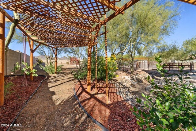 36908 N 19th St, Phoenix, AZ 85086 - fenced backyard featuring a pergola