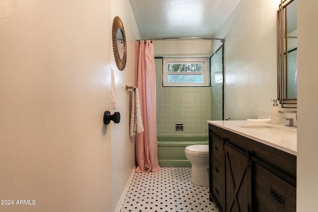 full bathroom with shower / bath combo with shower curtain, toilet, and vanity