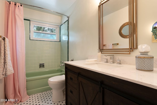 full bathroom featuring toilet, shower / tub combo, and vanity