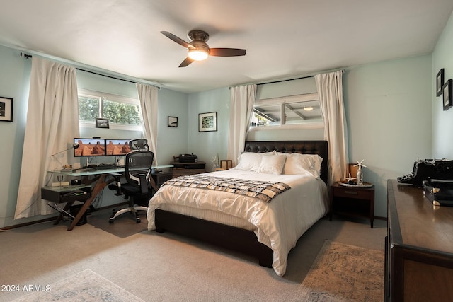 bedroom featuring ceiling fan and carpet