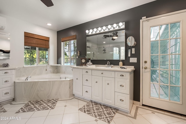 bathroom featuring ceiling fan, vanity, and tile patterned flooring