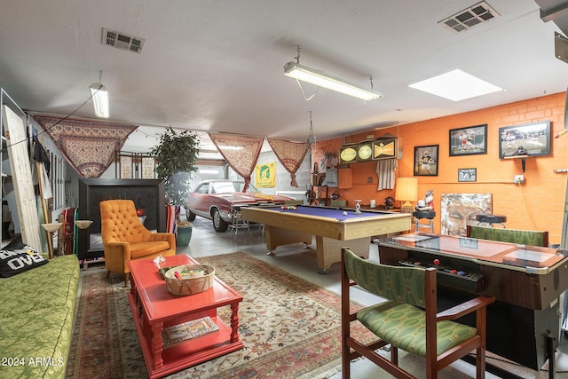 recreation room with billiards and concrete flooring