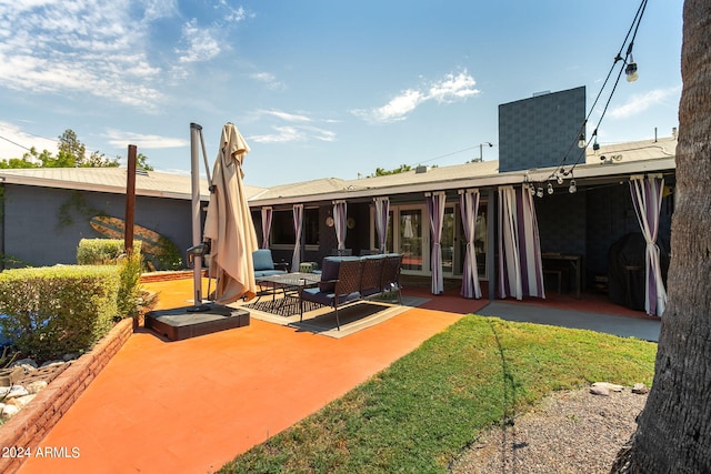 back of house featuring a patio area