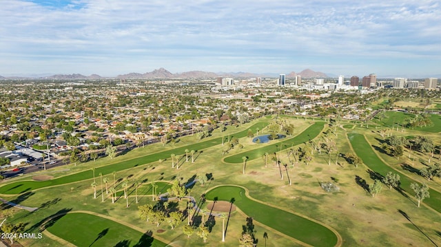 birds eye view of property with a mountain view