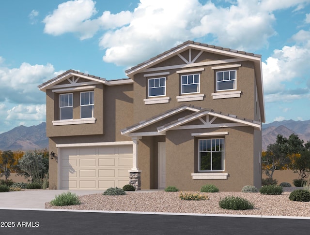 15744 W Camden Ave, Waddell, AZ 85355 - view of front of house with stucco siding, a mountain view, a garage, and driveway