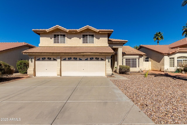 mediterranean / spanish-style home featuring a garage, a tiled roof, driveway, and stucco siding