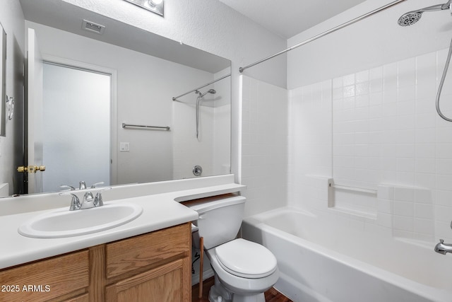 full bathroom featuring visible vents, vanity, toilet, and shower / bathing tub combination