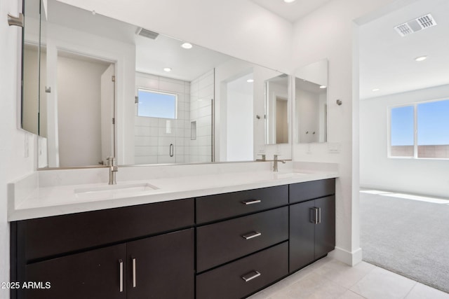 10253 E Ursula Ave, Mesa, AZ 85212 - bathroom with double vanity, plenty of natural light, a shower stall, tile patterned floors, and recessed lighting