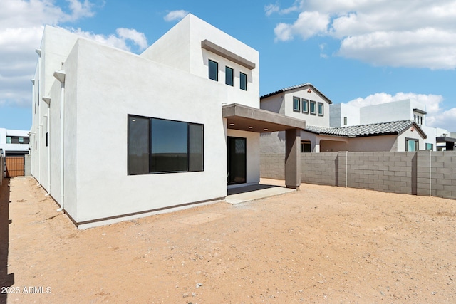 10253 E Ursula Ave, Mesa, AZ 85212 - rear view of house with stucco siding, a fenced backyard, and a patio