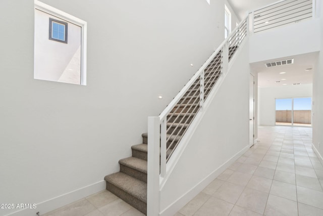 10253 E Ursula Ave, Mesa, AZ 85212 - staircase with tile patterned flooring and baseboards