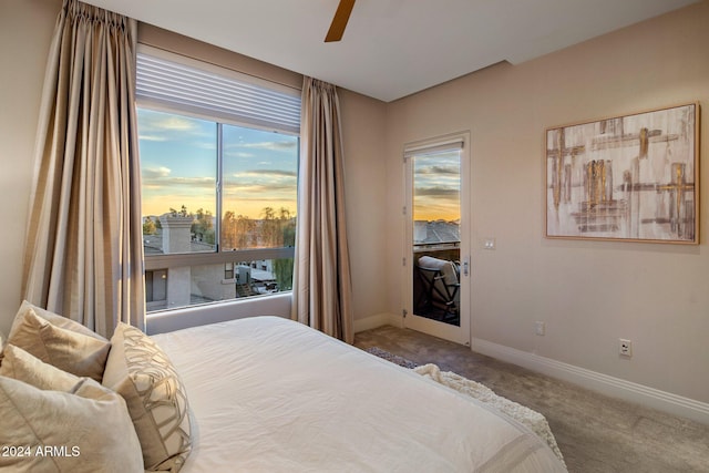 bedroom with ceiling fan and carpet floors