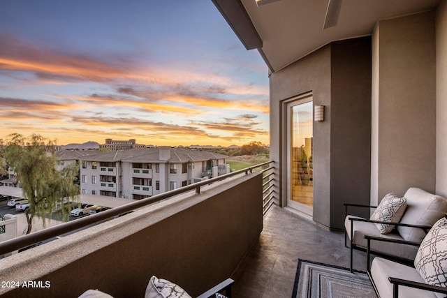 view of balcony at dusk