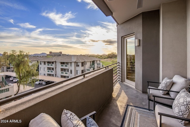 view of balcony at dusk