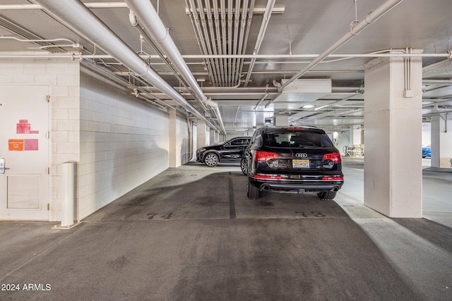 garage featuring a carport