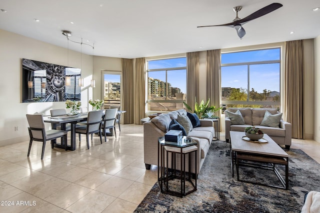 living room with light tile patterned flooring and ceiling fan