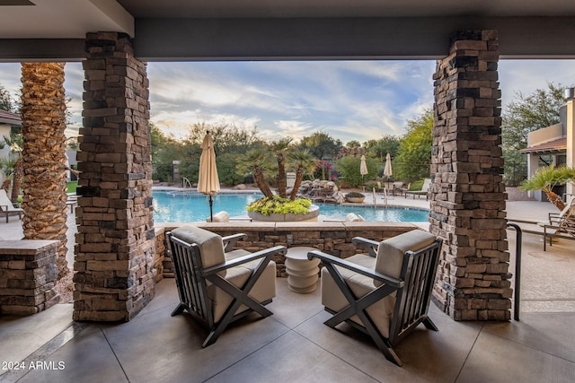 view of patio / terrace featuring a community pool