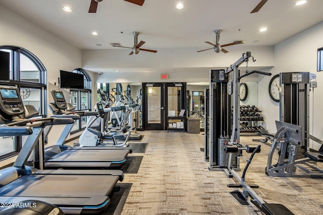 exercise room featuring carpet