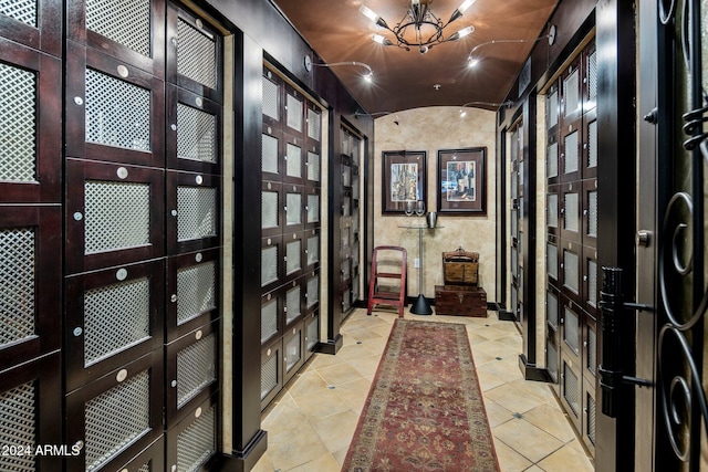 wine cellar with light tile patterned flooring