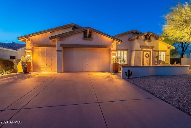 view of front of house with a garage