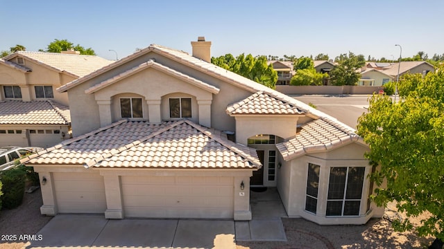 view of front of home with a garage