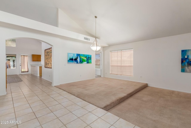 interior space featuring high vaulted ceiling