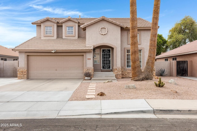 view of front facade with stone siding, stucco siding, driveway, and fence