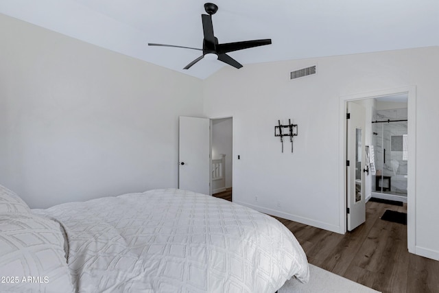 bedroom with visible vents, a ceiling fan, wood finished floors, baseboards, and lofted ceiling