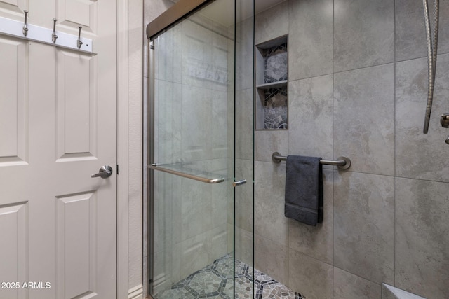 bathroom featuring a stall shower