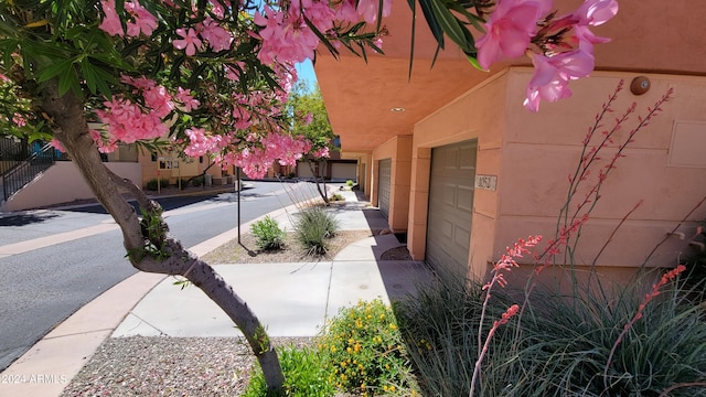 view of property exterior featuring a garage