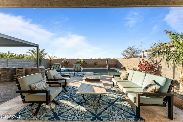 view of patio featuring a fenced in pool and an outdoor hangout area