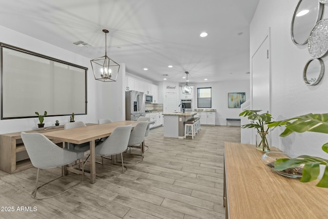 dining room featuring an inviting chandelier