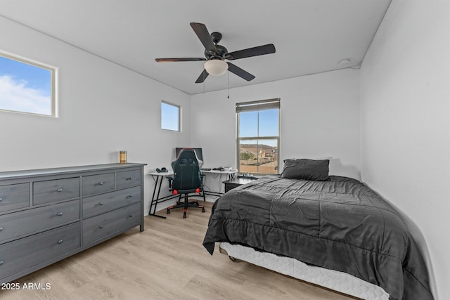 bedroom featuring ceiling fan and light wood-type flooring