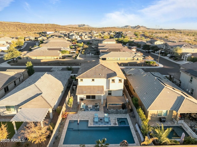 bird's eye view with a mountain view