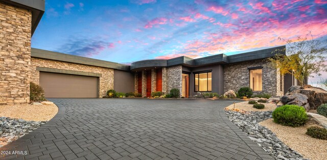 view of front of home featuring a garage